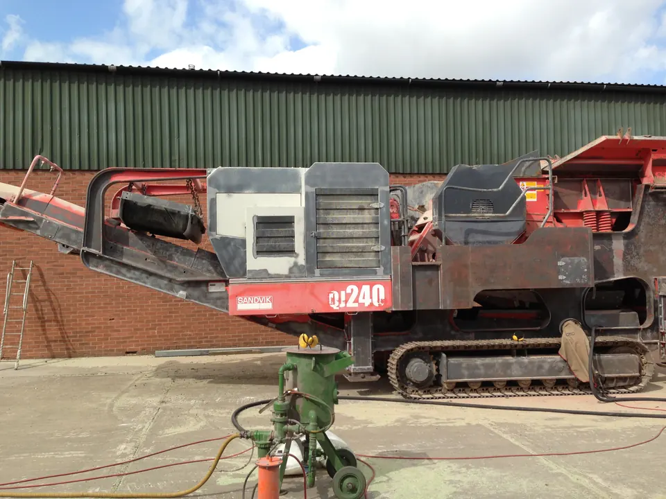 A tracked quarry crusher on site, ready for mobile shot blasting