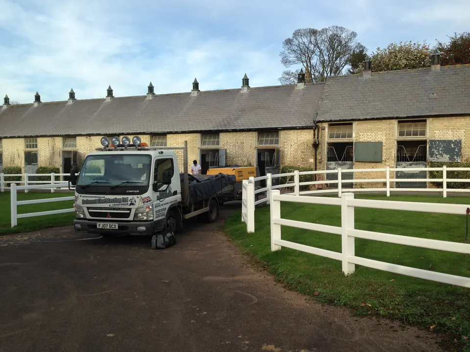 Belmont blasting truck on site at horse racing stables in Newmarket