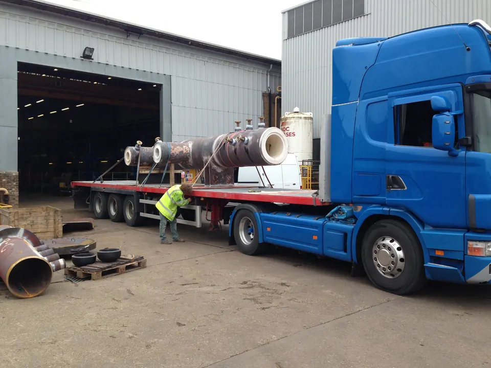 Lorry collecting steel items to bring back to the Belmont yard for blasting